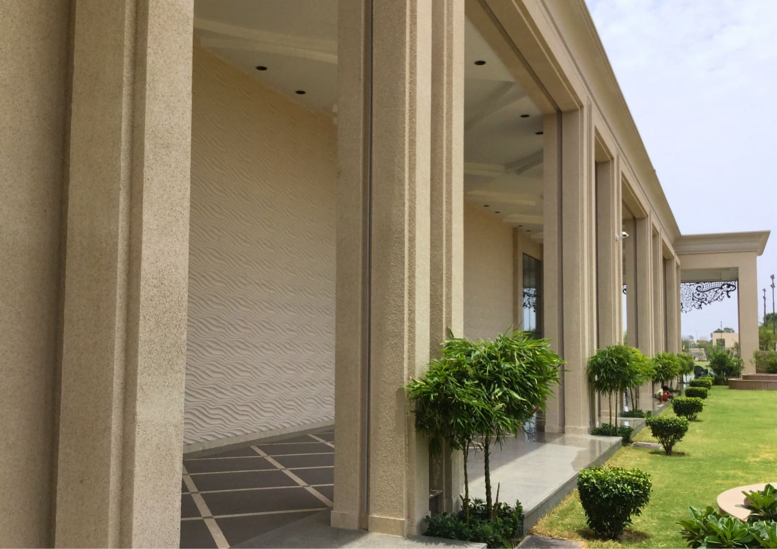 Flexible stone on columns and a textured feature wall.
